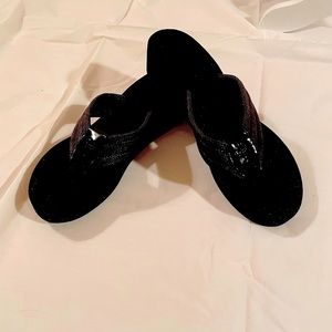 Eliza B black raffia wedge flip flops